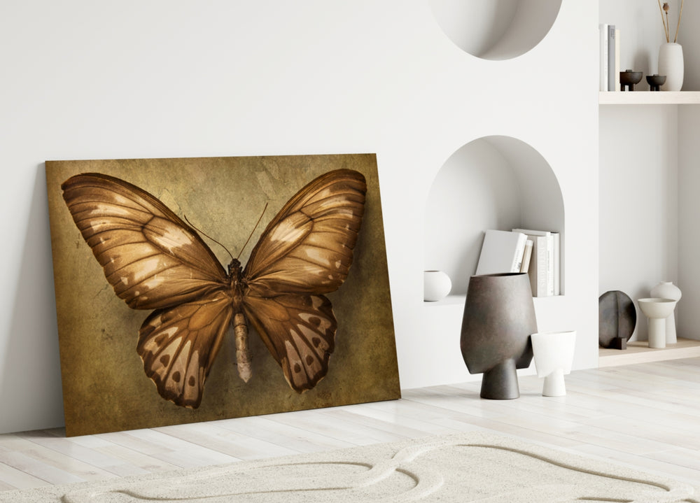 Butterfly glass wall art styled above a console in a study