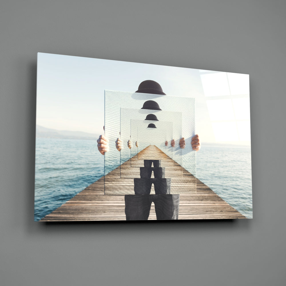 Loop close-up showing infinite bowler-hat figures along wooden pier