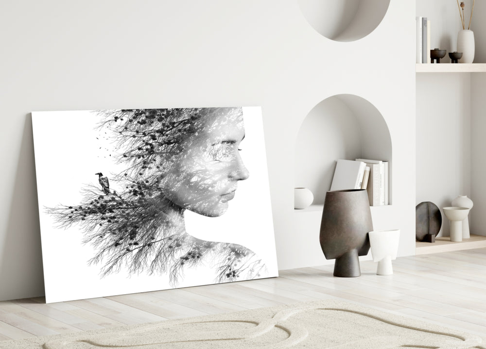 Woman Bird glass wall art styled above a bed in a master bedroom