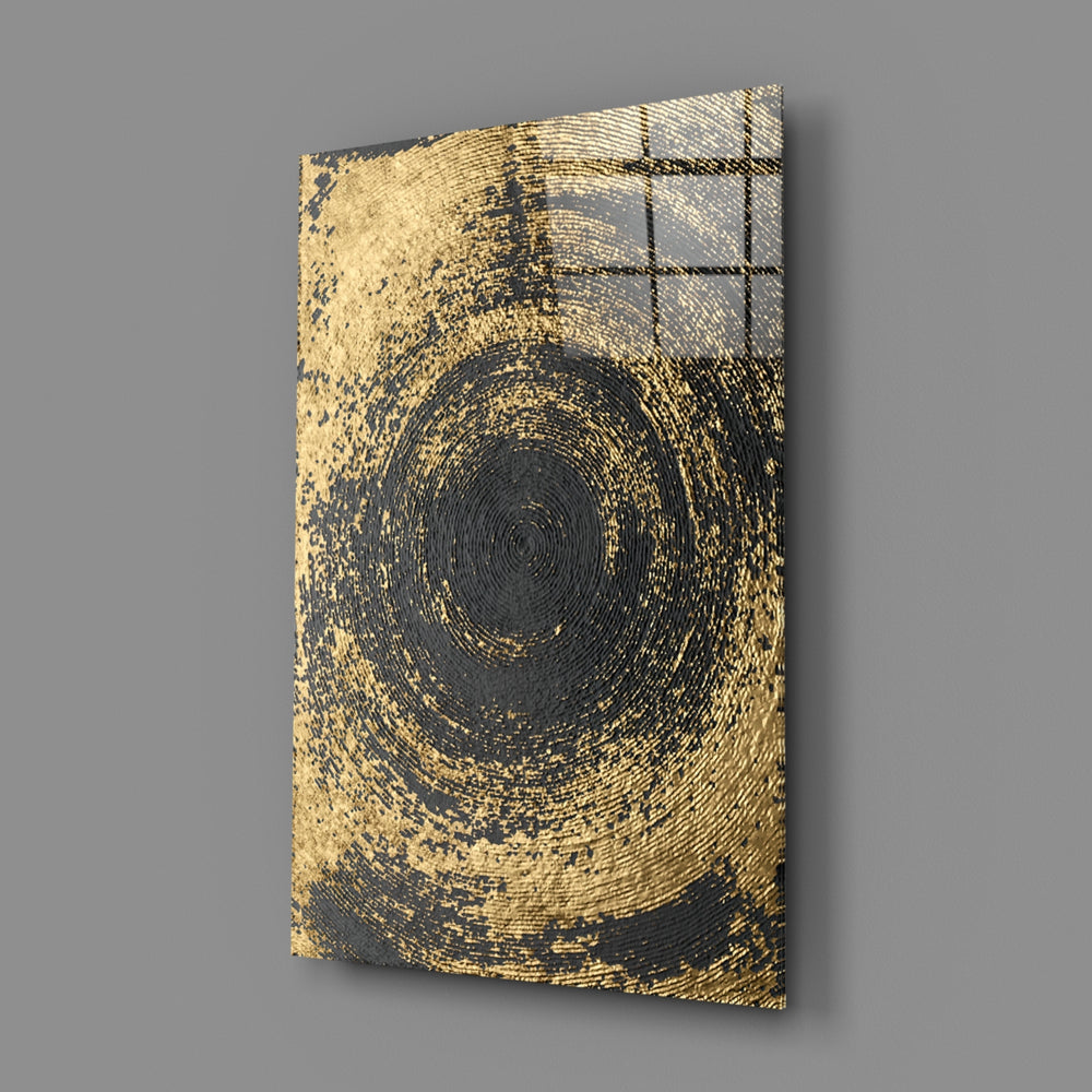 Abstract Loop close-up showing gold spiral ripple radiating outward on charcoal