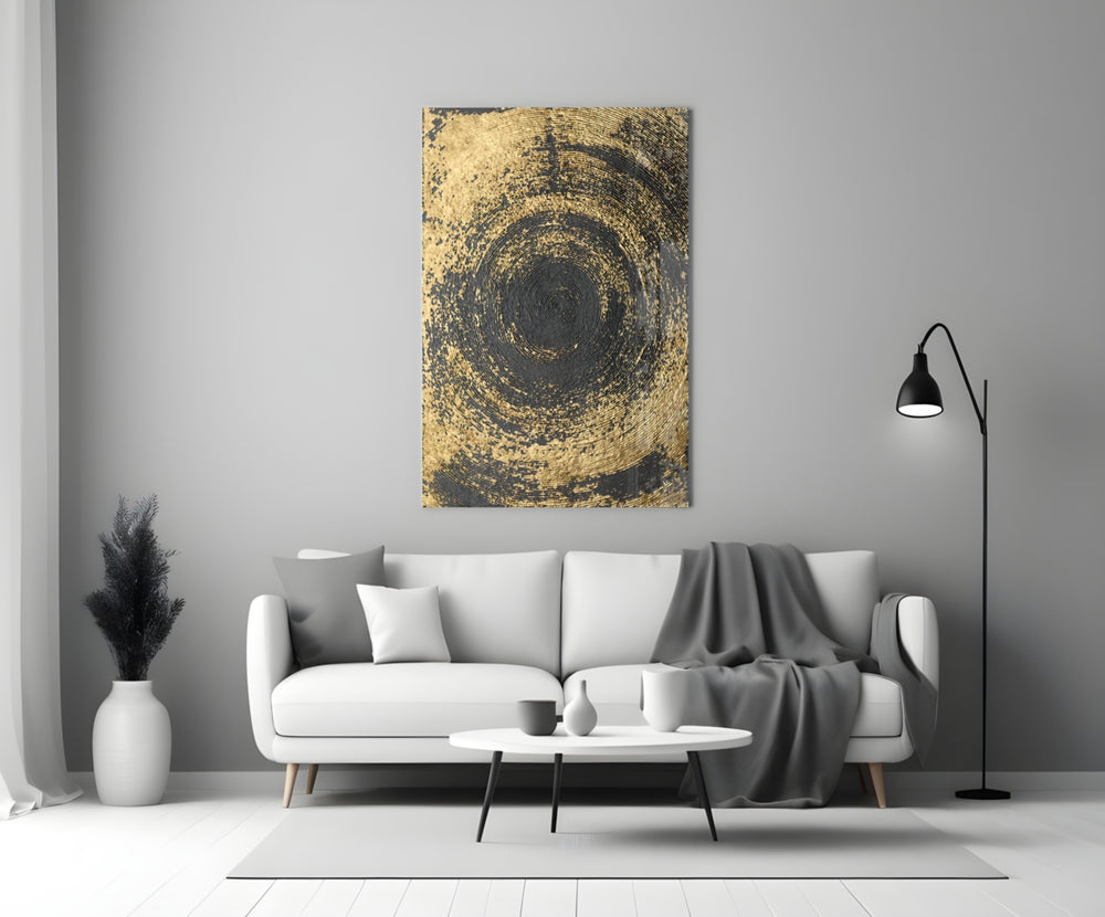 Abstract Loop glass wall art styled above a sofa in a living room