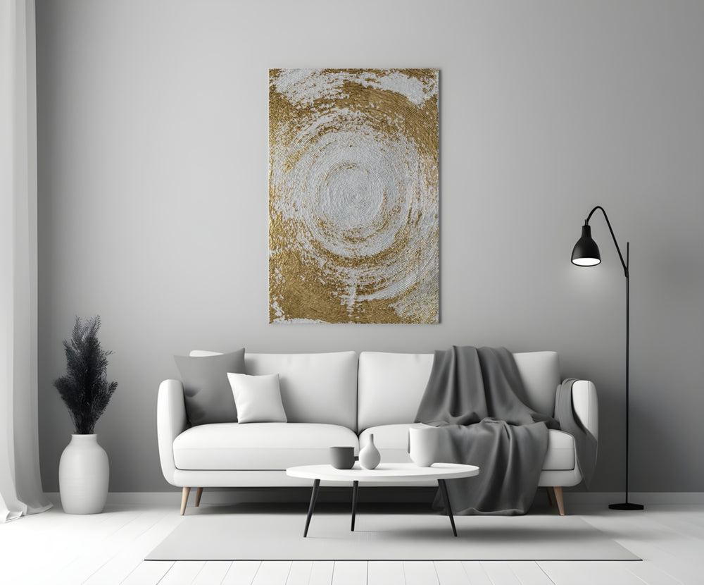 Abstract Loop glass wall art styled above a credenza in a living room