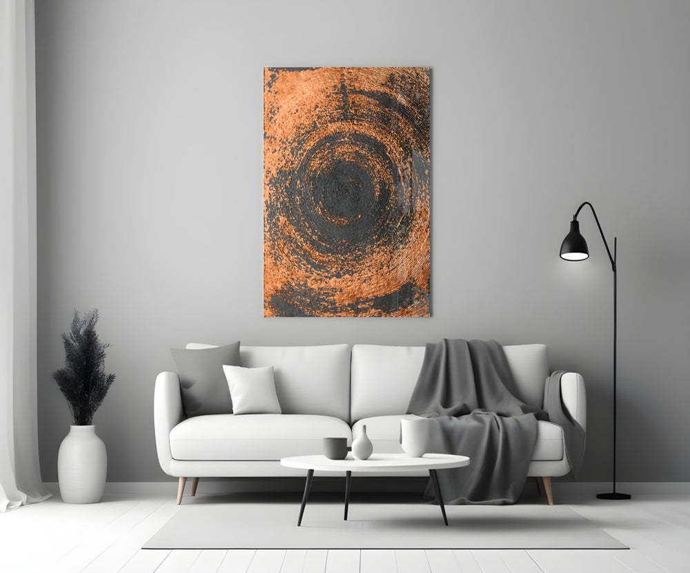 Abstract Loop glass wall art styled above a sofa in a living room