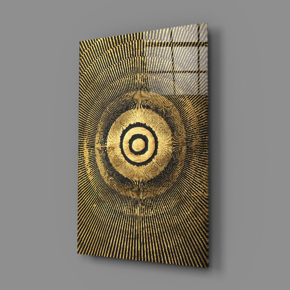 Abstract Loop close-up showing gold concentric sunburst on charcoal ground