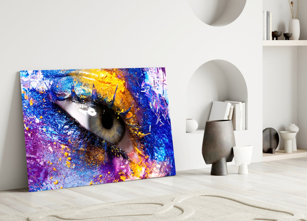 Pupil glass wall art styled above a sofa in a bedroom