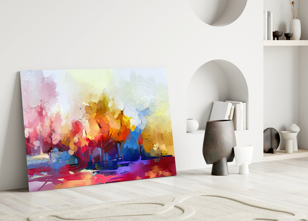 Abstract Trees glass wall art styled above a console in a living room