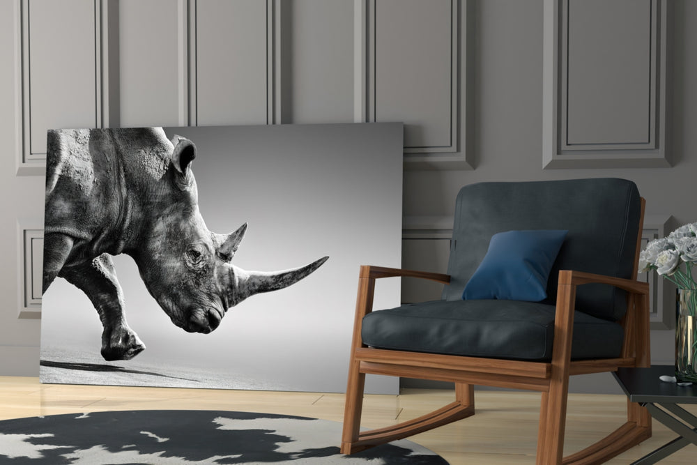 Black Rhino artwork anchoring a wall with bold naturalist palette