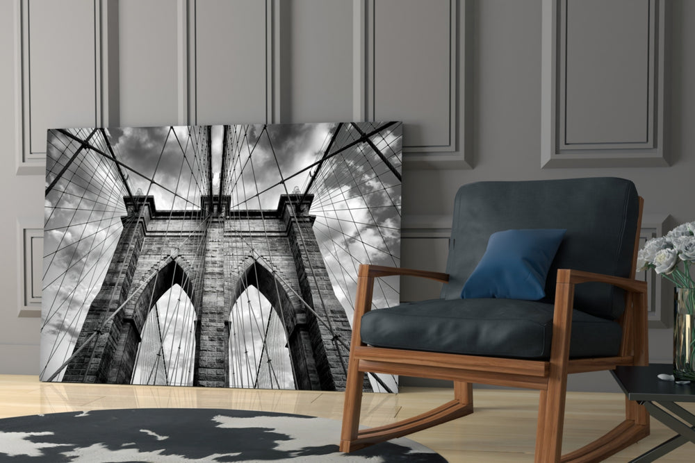 Brooklyn Bridge artwork anchoring a wall with bold urban palette