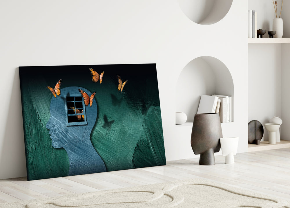Butterfly Effect glass wall art styled above a credenza in a bedroom