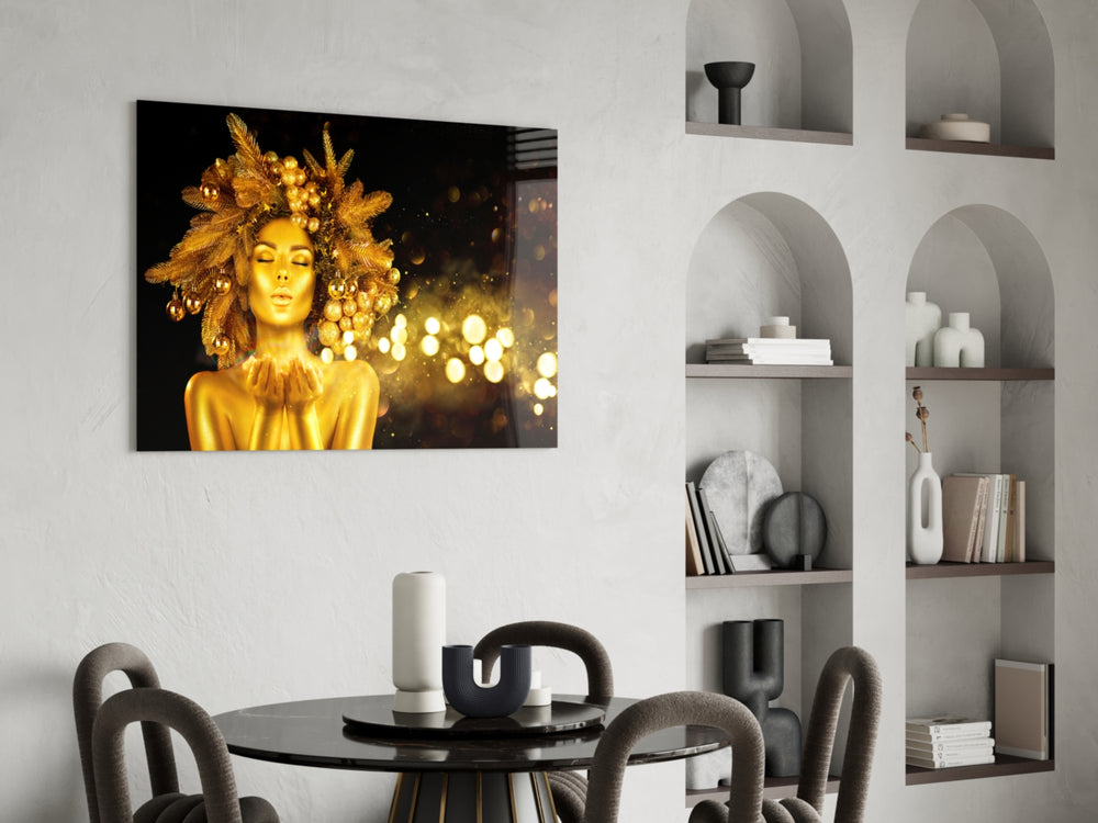 Gold Woman glass print enhancing a dining room with cinematic warmth