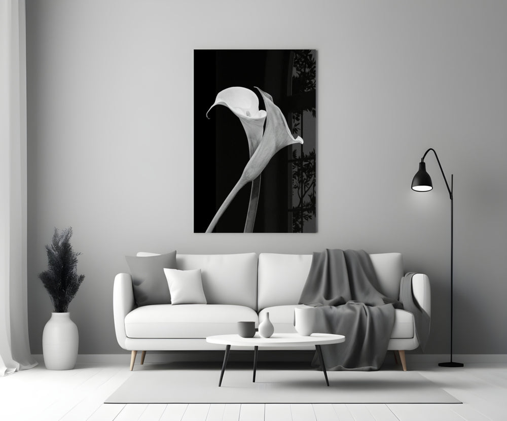 Flower glass wall art styled above a credenza in a bedroom