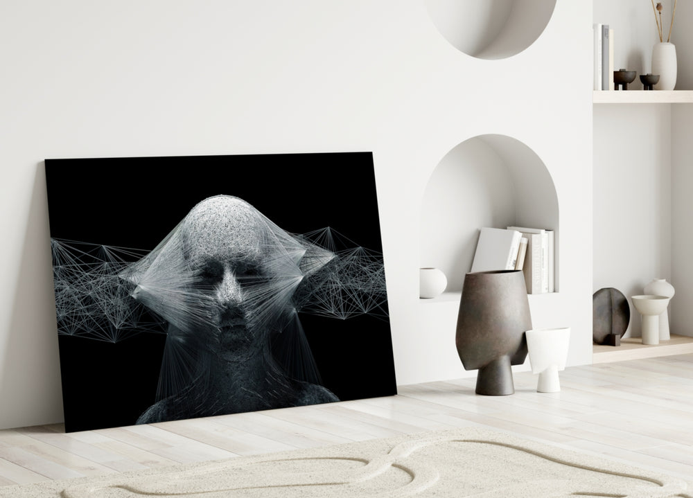 Self glass wall art styled above a credenza in a living room