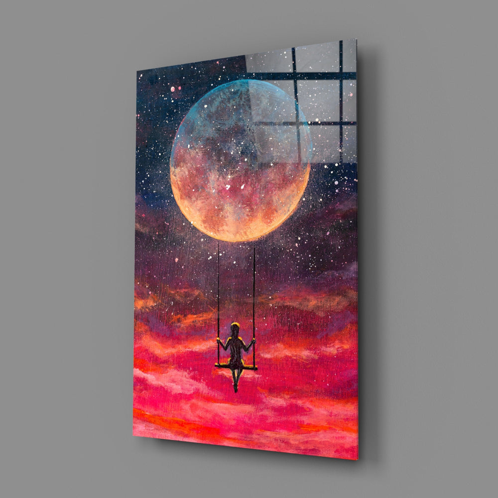 Freedom close-up showing silhouette on swing under luminous full moon