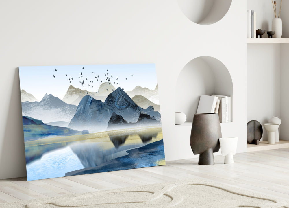 Mountains glass wall art styled above a credenza in a living room