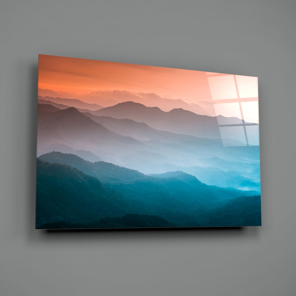 Abstraction close-up showing cobalt and teal mountain ridges under coral dawn