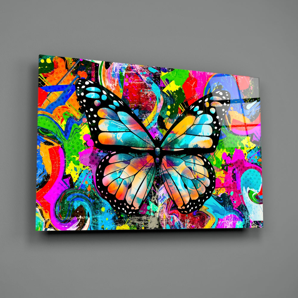 Butterfly close-up showing monarch wings on magenta cobalt lime graffiti splash