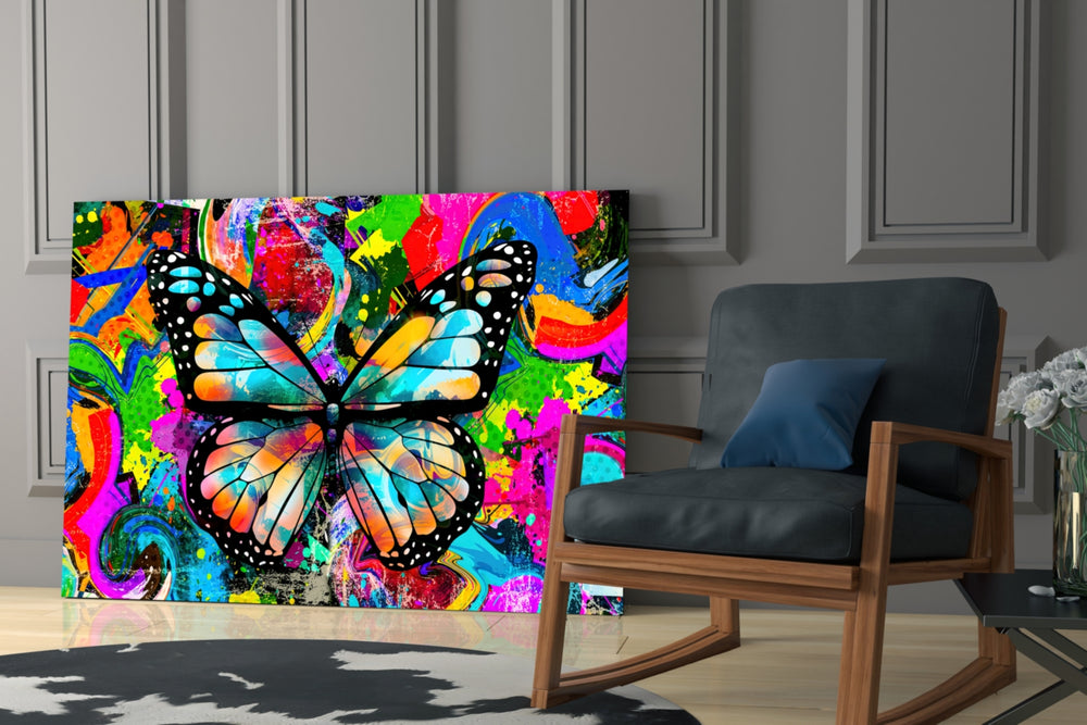 Butterfly artwork anchoring a wall with bold energetic palette