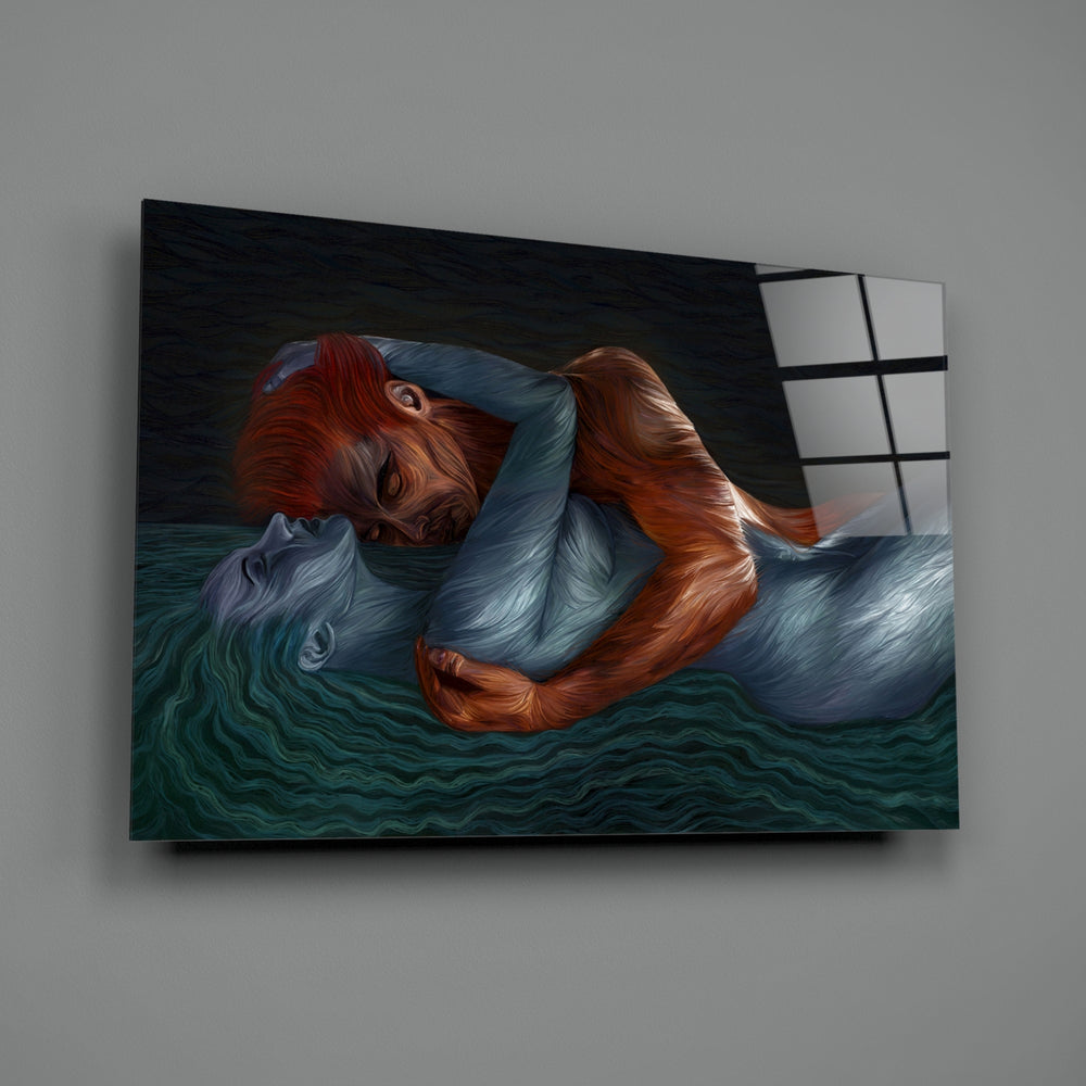 Water and Fire close-up showing flame-haired and teal-watered figures embracing