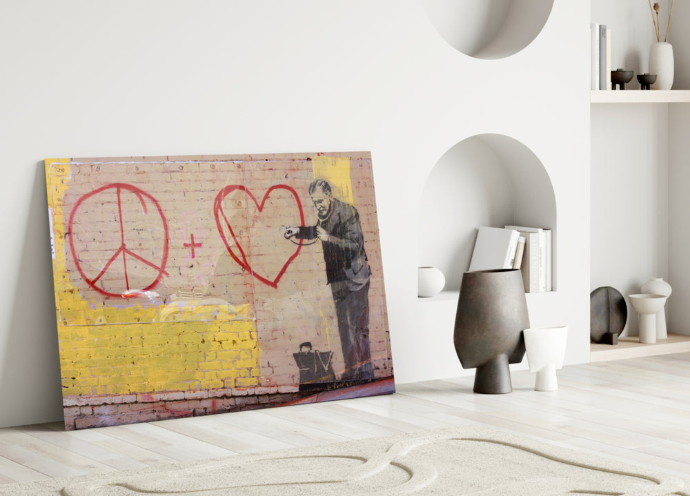 Graffiti Doctor close-up showing doctor with stethoscope and red heart on yellow brick