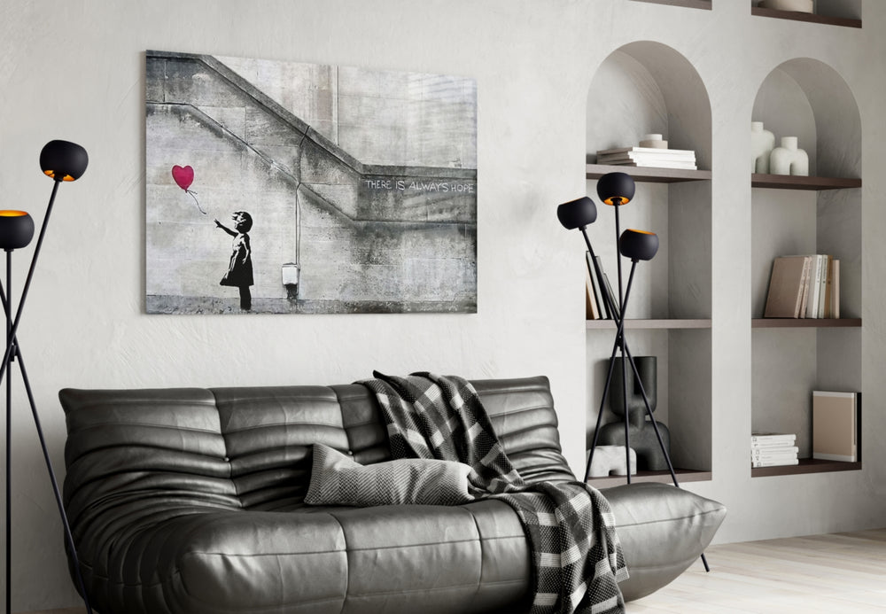 Flying Heart glass wall art styled above a bed in a bedroom