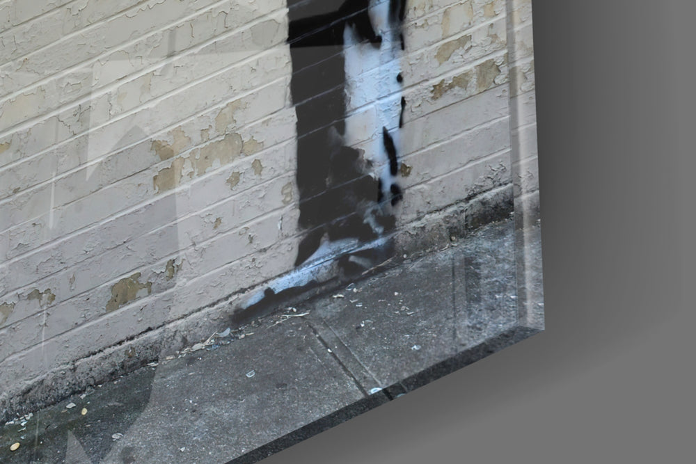 What We Do in Life artwork anchoring a wall with thoughtful message-driven palette
