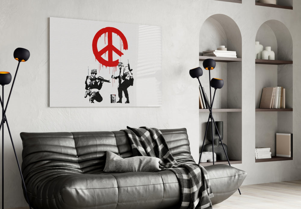 War for Peace glass wall art styled above a sofa in a living room