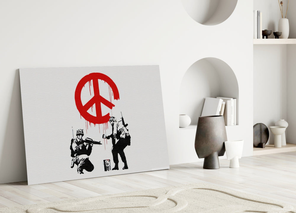 War for Peace close-up showing two stenciled soldiers spraying dripping red peace sign