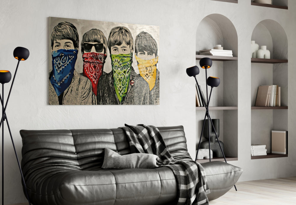 Activist glass wall art styled above a sofa in a living room