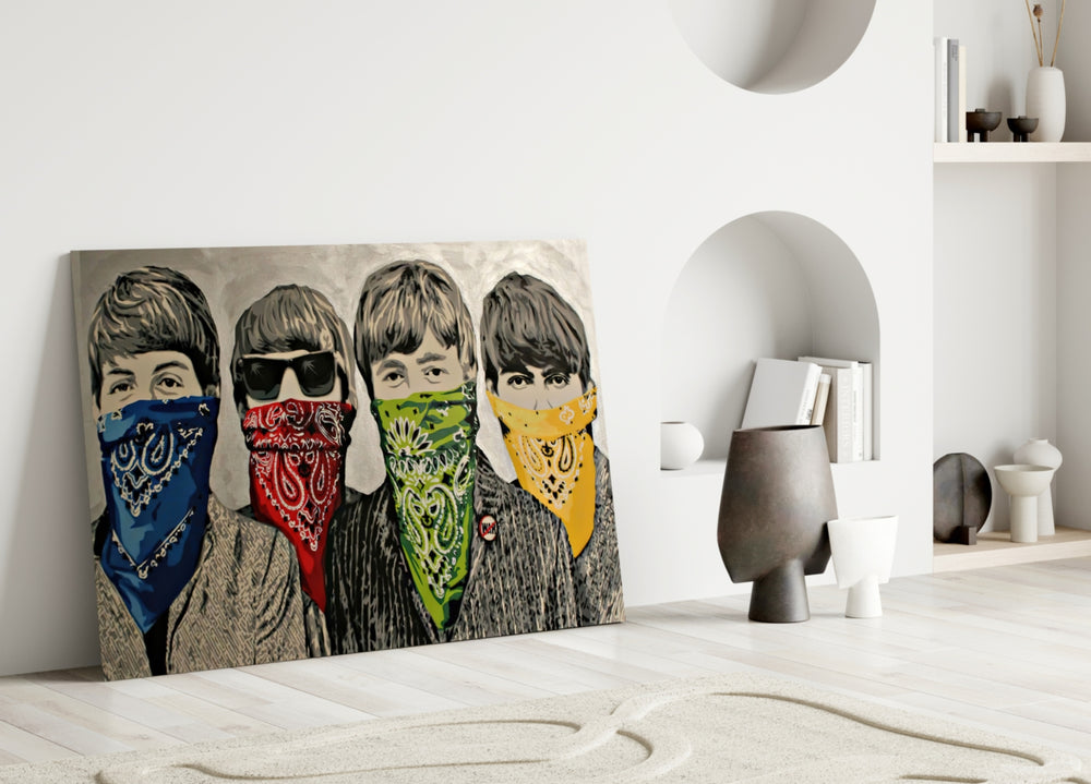 Activist close-up showing four Beatles in cobalt crimson jade and marigold paisley bandanas