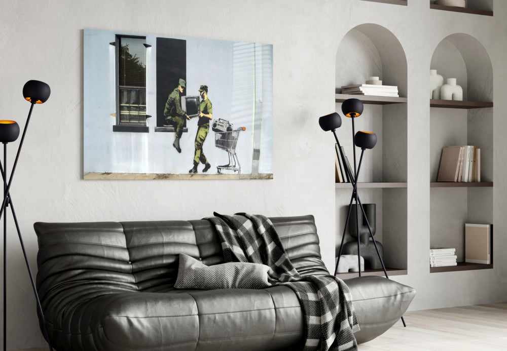 Soldier glass wall art styled above a desk in an office