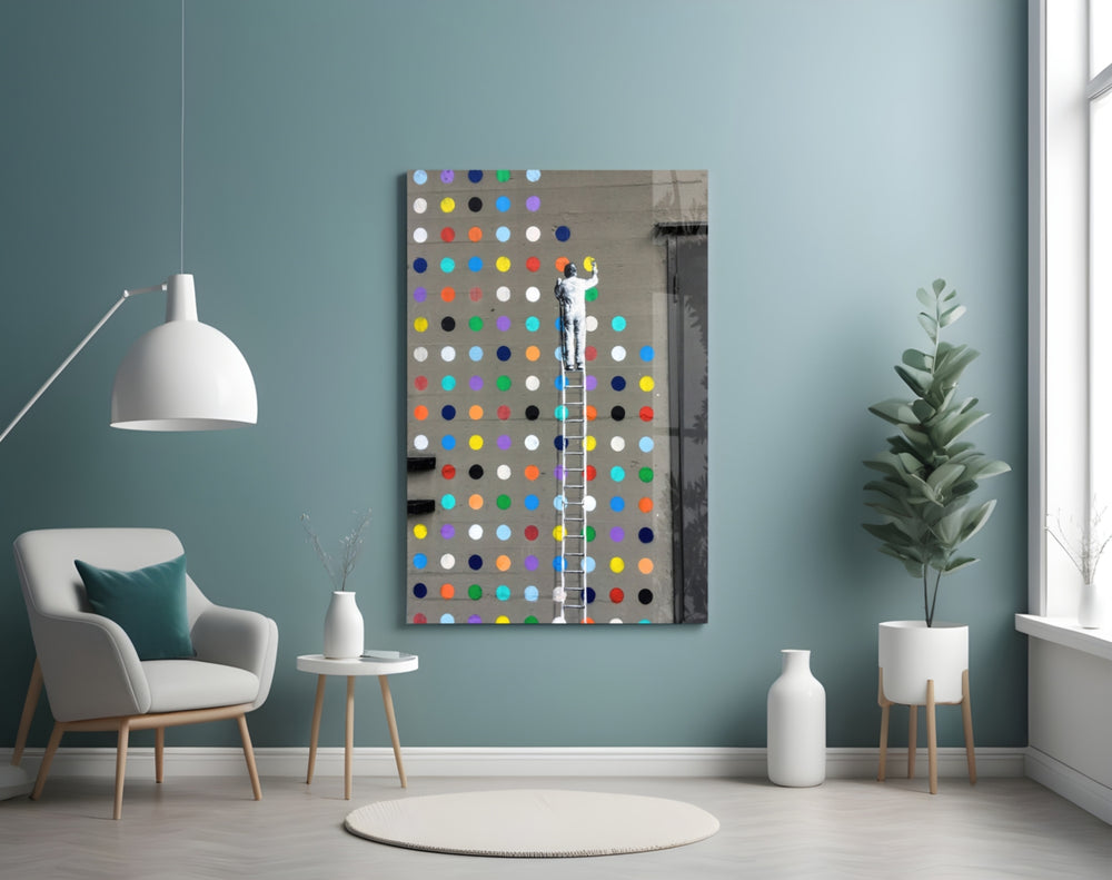 Dots glass wall art styled above a desk in a kids room