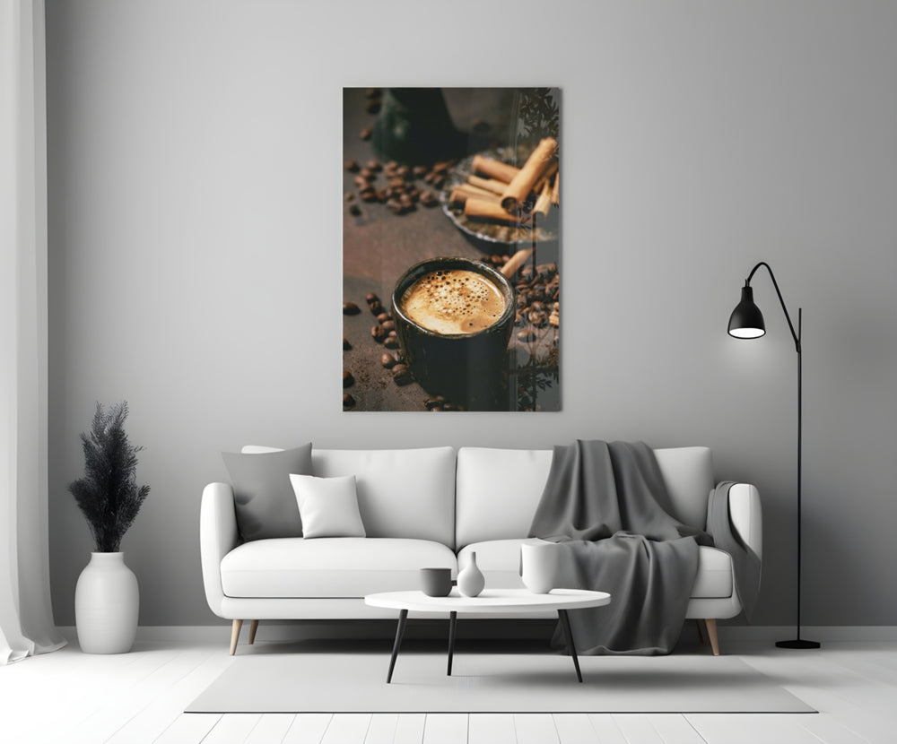 Cinnamon Coffee close-up showing stoneware cup with crema beside cinnamon sticks and beans