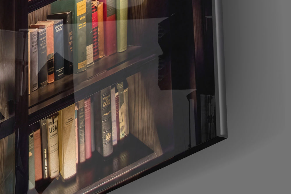 Bookshelf artwork anchoring a wall with warm scholarly palette