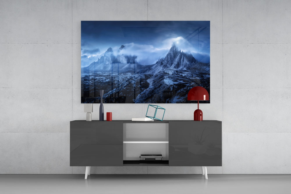 Imposing Mountains panel catching low light to reveal its stormy gravity