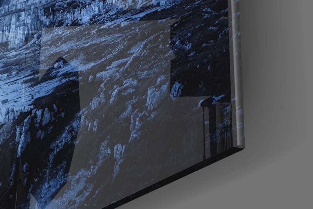 Imposing Mountains artwork anchoring a wall with dark dramatic palette
