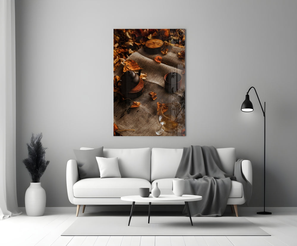 Autumn Picnic close-up showing burlap blanket with coffee pot kettle and fallen leaves