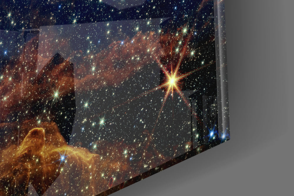 Space artwork anchoring a wall with dark cosmic palette