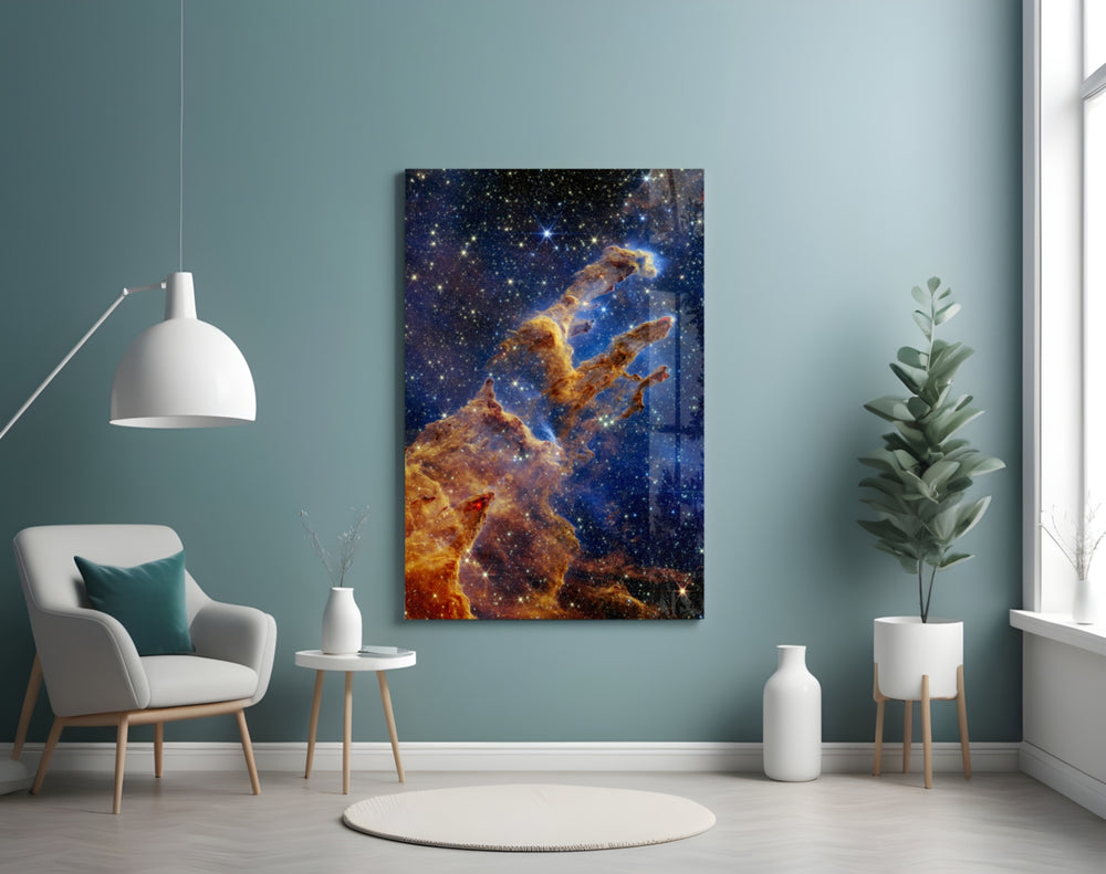 Space glass wall art styled above a desk in a kids room