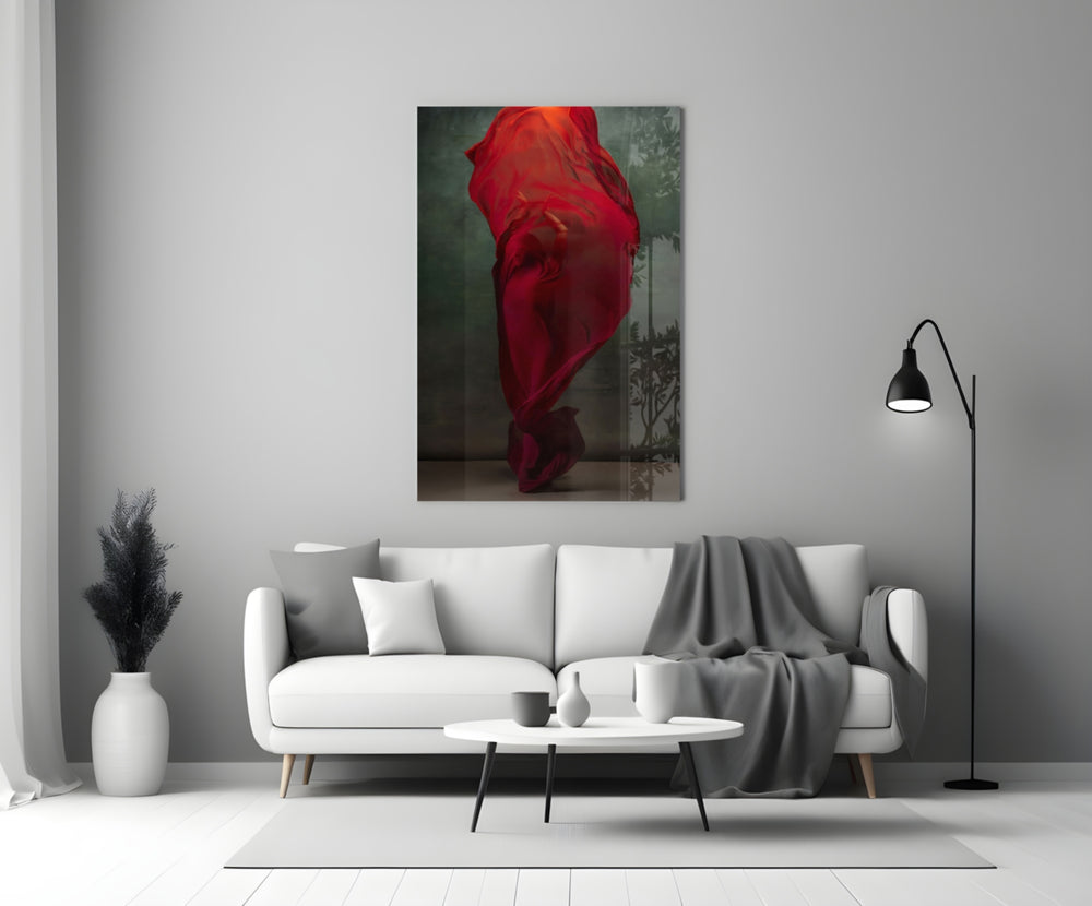 Ballerina close-up showing dancer wrapped in billowing crimson silk veil