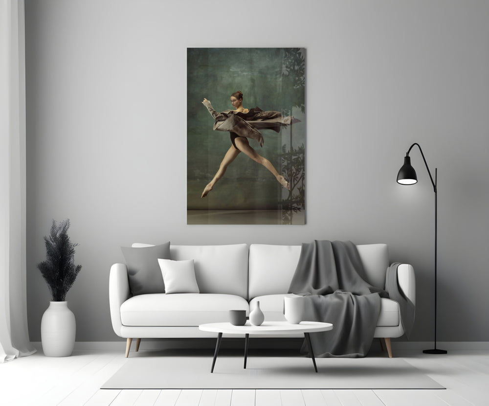 Ballerina close-up showing dancer mid-leap with billowing slate trench