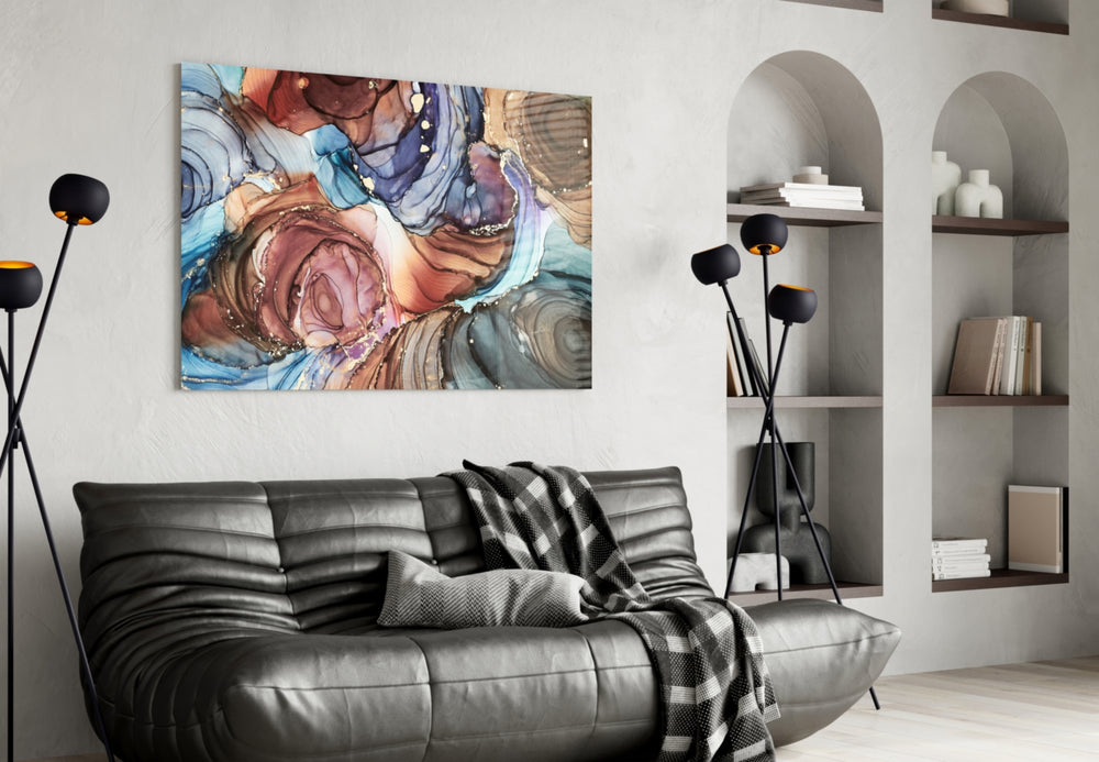 Marble glass wall art styled above a bed in a bedroom