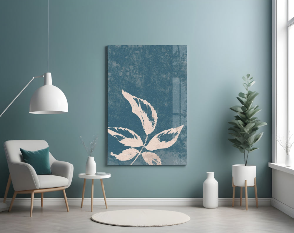 Leaves glass wall art styled above a bed in a bedroom