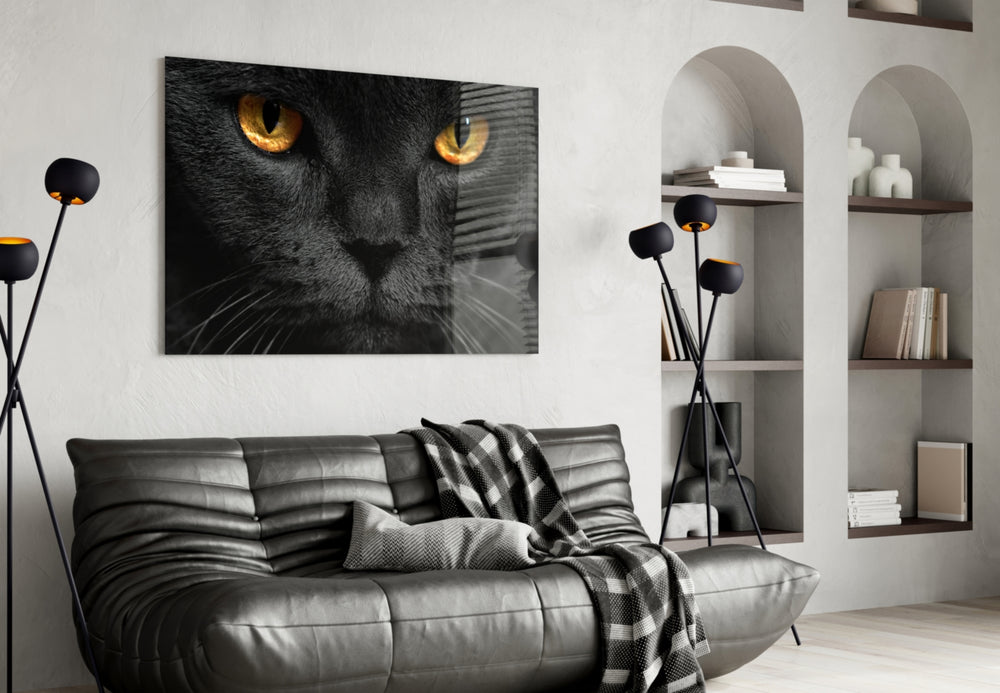 Cat glass wall art styled above a bed in a bedroom