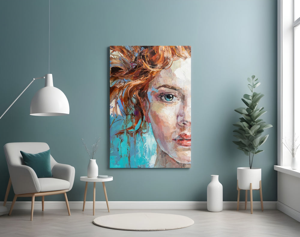 Woman glass wall art styled above a bed in a bedroom