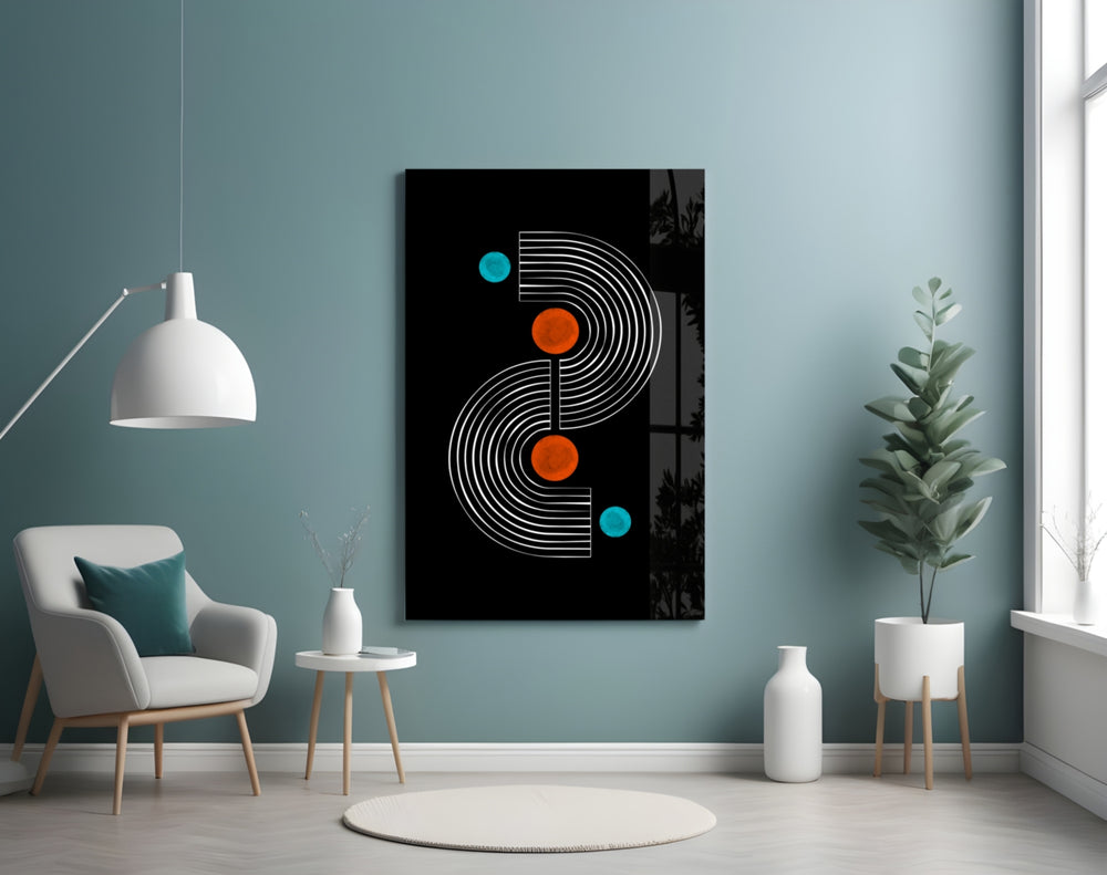 Pattern glass wall art styled above a desk in an office