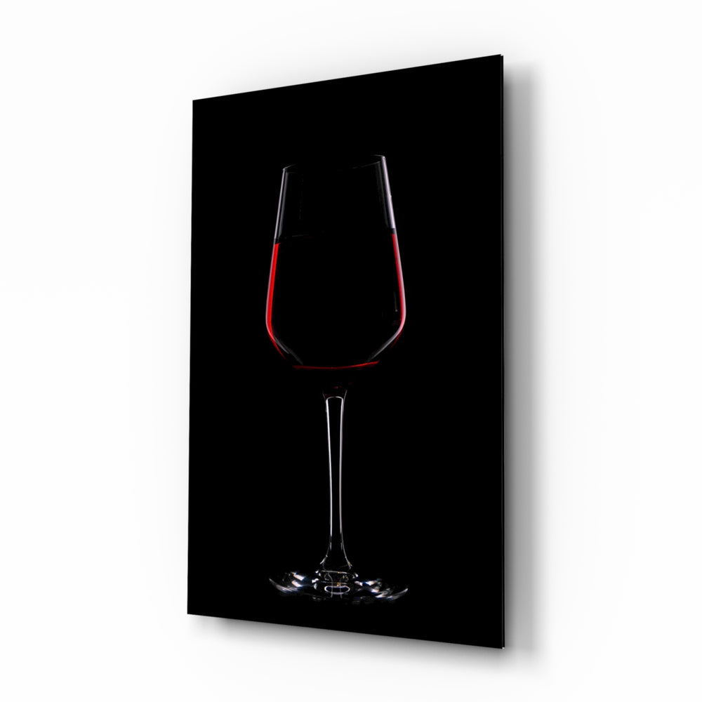 Wine glass wall art displayed above a marble bar in a slate-walled lounge with brushed-brass tools and stoneware decanters