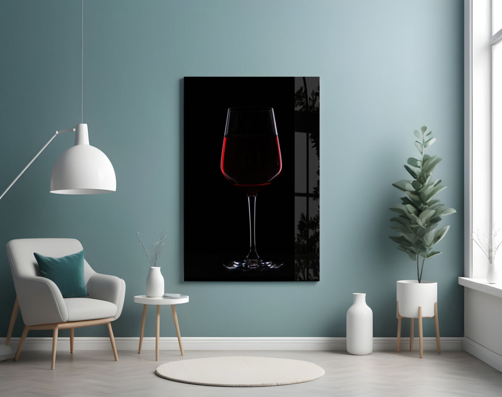 Wine glass wall art styled above a sideboard in a dining room