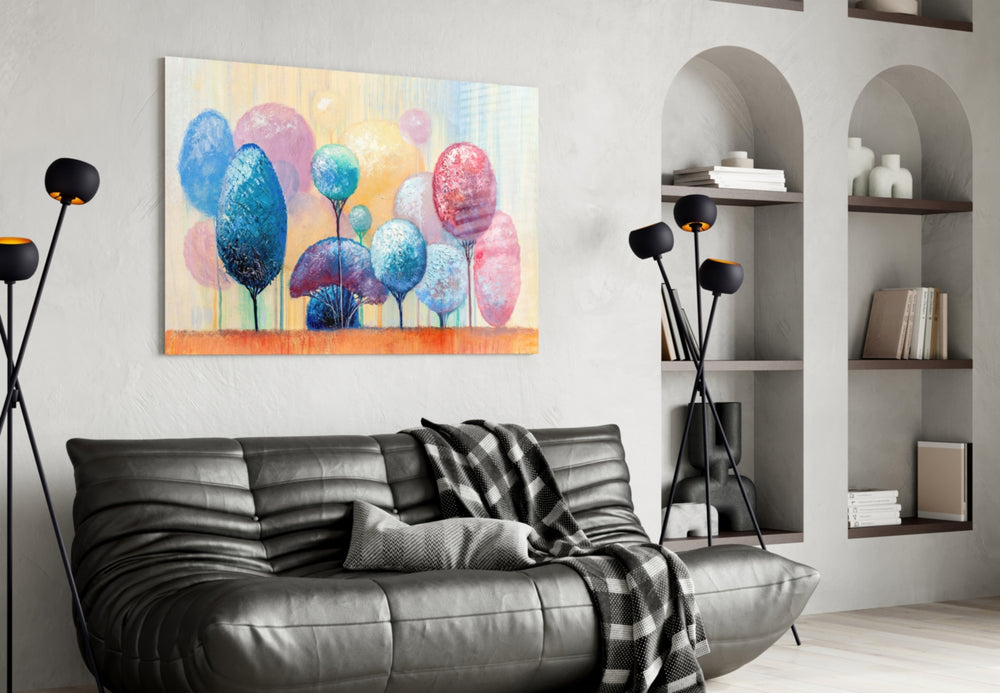 Trees of a Dream glass wall art styled above a bed in a kids room
