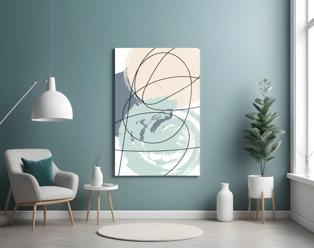 Chaotic glass wall art styled above a bed in a bedroom