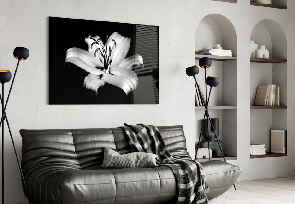 Lilies glass wall art styled above a bed in a bedroom